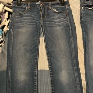 American Eagle Jeans size 2 long. I would consider it a medium wash and skinny